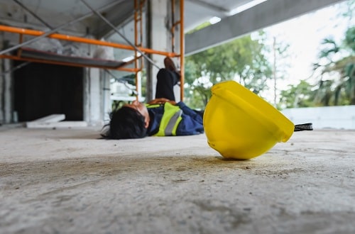 Construction Worker Lying on Floor iStock sorn340