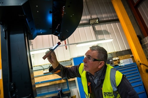 Man Inspecting Equipment CFTS