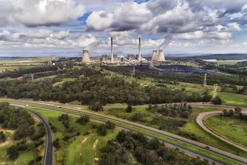 Bayswater power plant, Australia. Black coal is burnt for power generation, emitting carbon dioxide into atmosphere on a sunny day. Photograph: iStock/zetter
