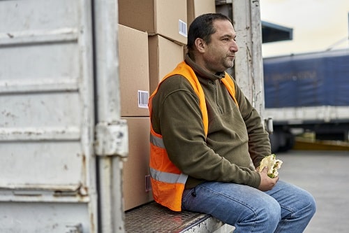 Driver Eating Sandwich iStock