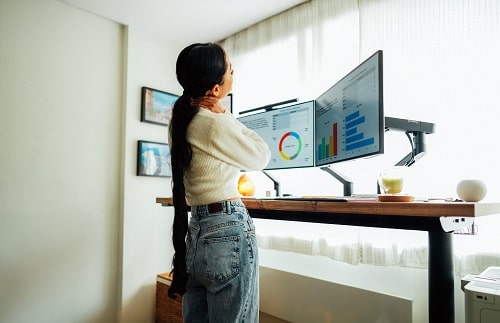 Woman at Stand Up Desk iStock martin-dm