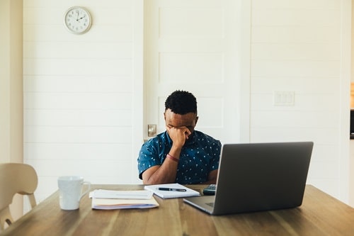 Stressed Man at Computer iStock RichVintage