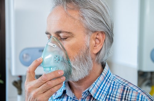 Man With Breathing Mask iStock D Keine