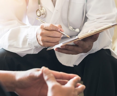 Doctor With Patient iStock Chinnapong